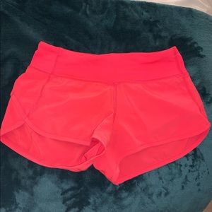 Hot pink lululemon speed up shorts